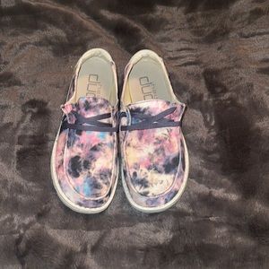 Hey Dude Slip on shoes. Tie-dye coloring, pink, purple, and a little bit of blue